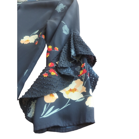 Floral blue with white and red. Size is extra small but easily fits small. - Picture 3 of 6